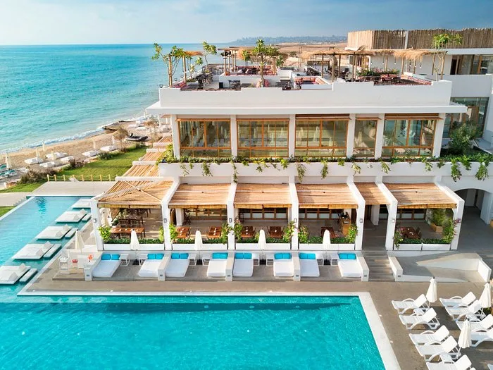 La Siesta Resort — beachfront terraces and pool deck above the shore