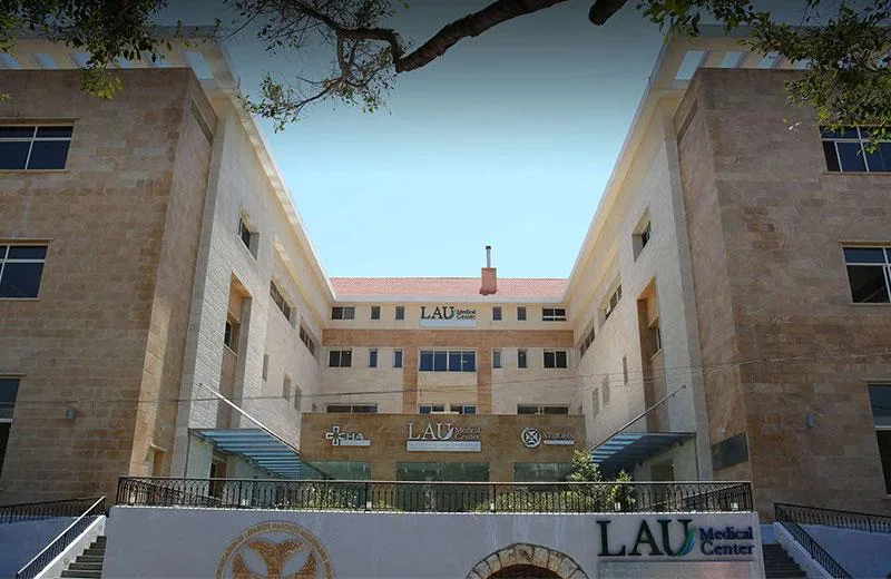 LAU Medical Center — stone-faced hospital wings framing the main entrance