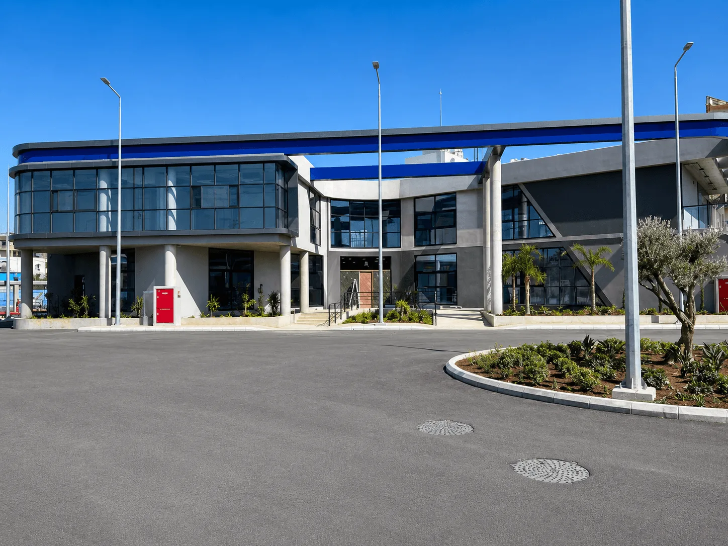 Front elevation of the administration building and its landscaped approach